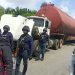 NSCDC operatives burst illegal loading point of stolen petroleum products, impound trucks & arrest 4 suspects in Delta